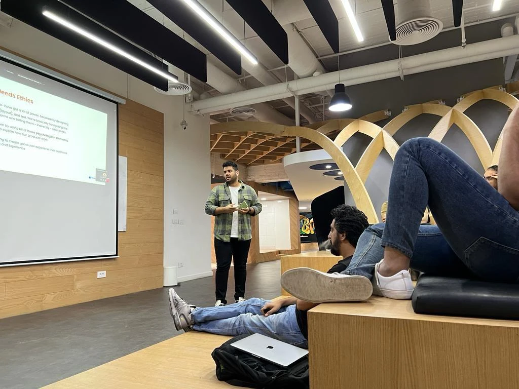 Amir giving a talk on design ethics to a seated audience